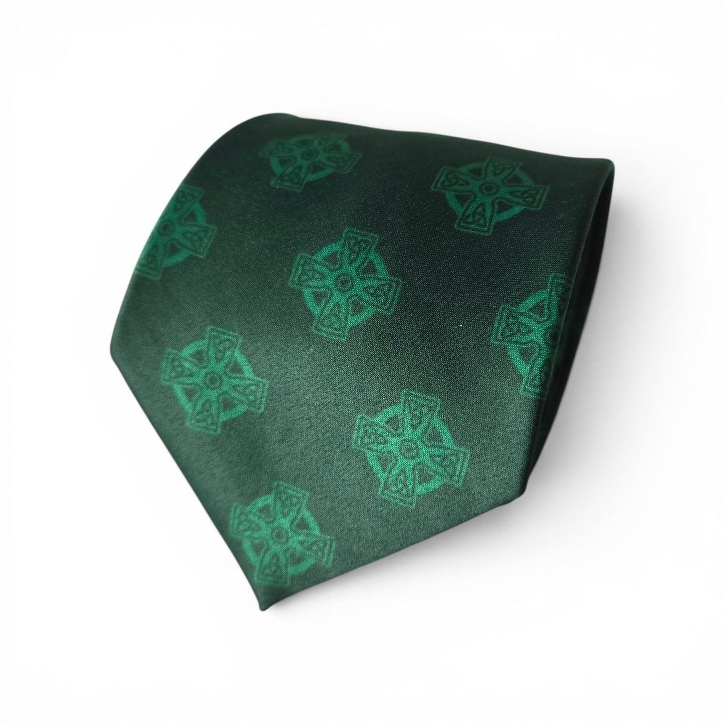 Celtic Cross necktie in forest green with repeating tonal dark green Celtic cross pattern, rolled product shot on white background