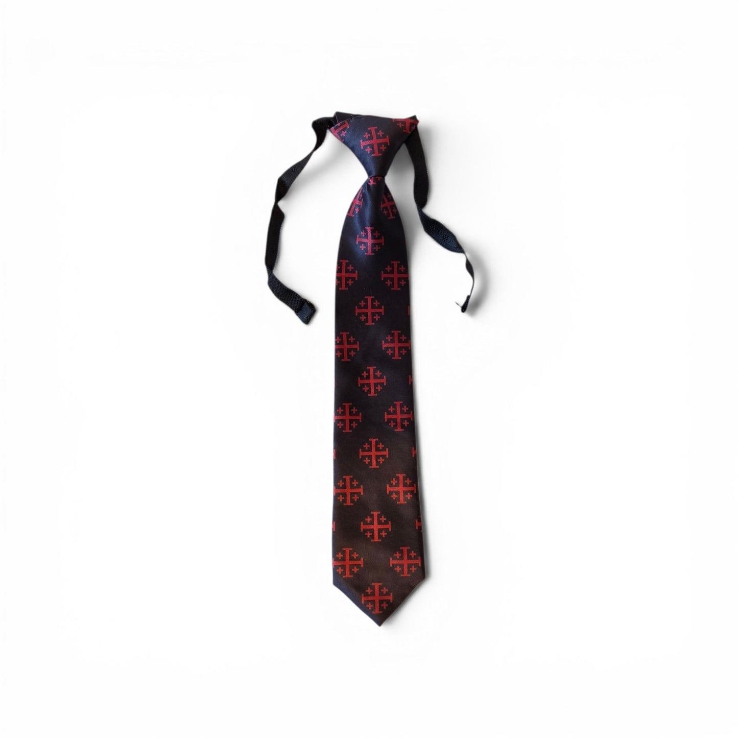 Boys Jerusalem Cross pretied necktie in black with repeating red Jerusalem Cross medallion pattern, full length on white background