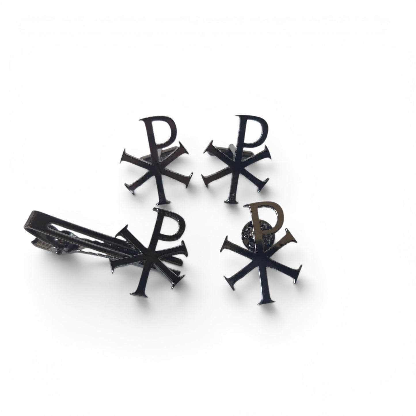 Chi-Rho gift set in silver chrome including two cufflinks, tie bar, and lapel pin with Christogram design, product shot on white background