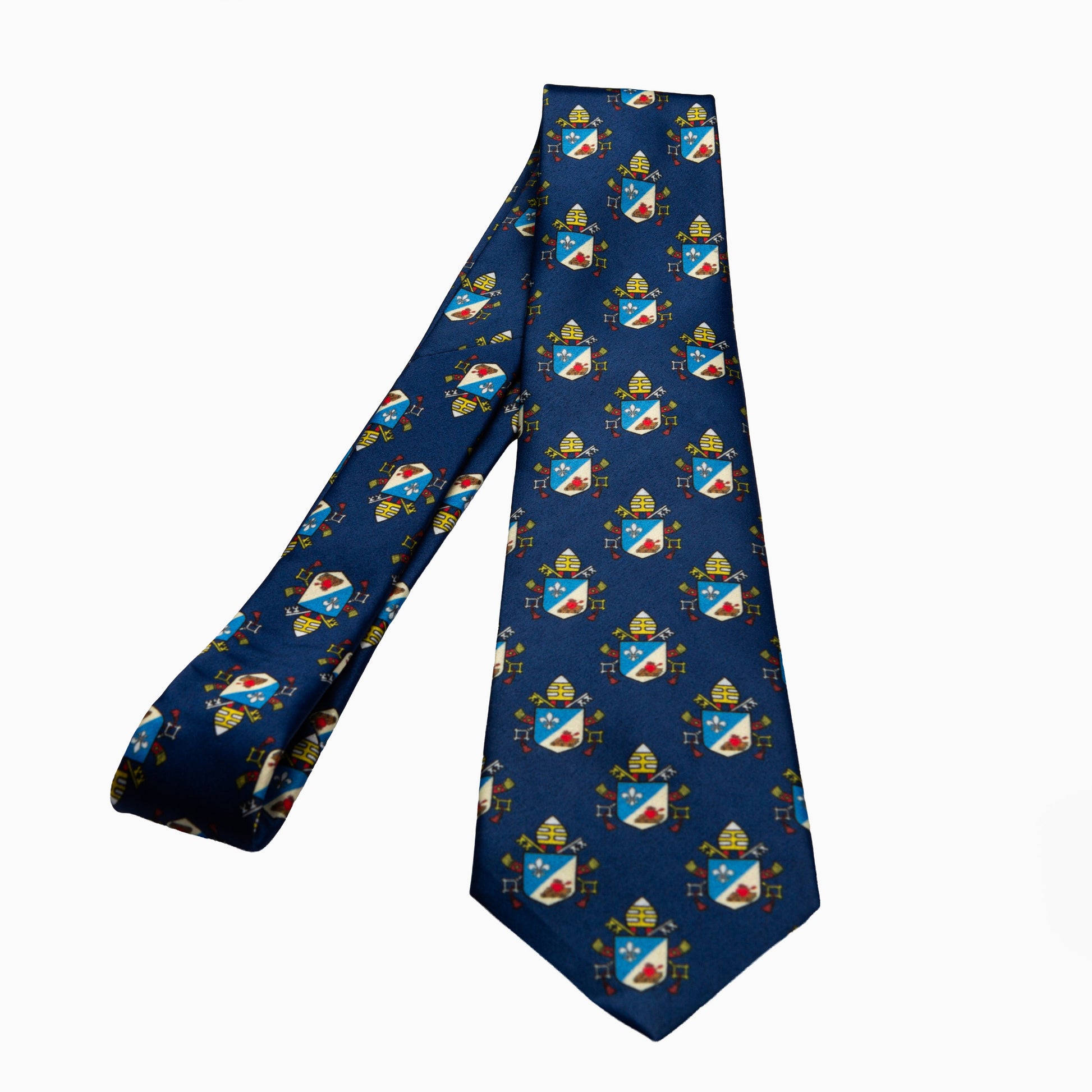 Pope Leo XIV navy necktie featuring papal coat of arms heraldic pattern, full length flat lay
