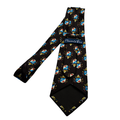 Pope Leo XIV Black necktie showing ProselyTies brand label and back detail, full length flat lay