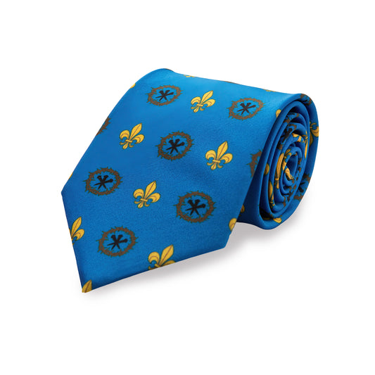 St. Louis IX royal blue necktie with gold fleur-de-lis and crown of thorns Chi-Rho medallion pattern, rolled product shot on white background