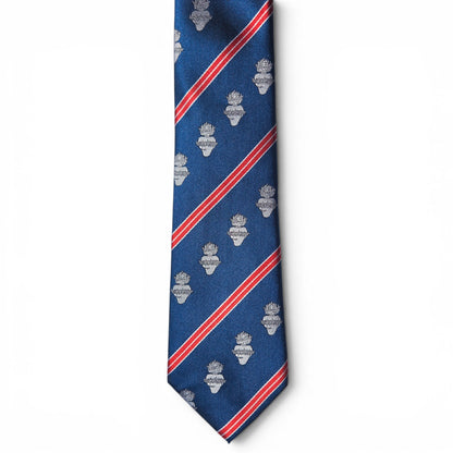 A navy blue silk necktie with diagonal red and white stripes and repeating sacred heart motifs, displayed on a clean white background flat.