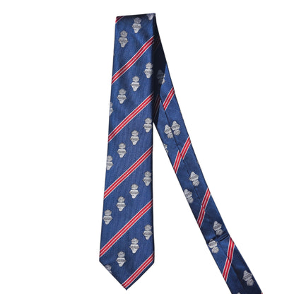 A navy blue silk necktie with diagonal red and white stripes and repeating sacred heart motifs, displayed on a clean white background front/back.